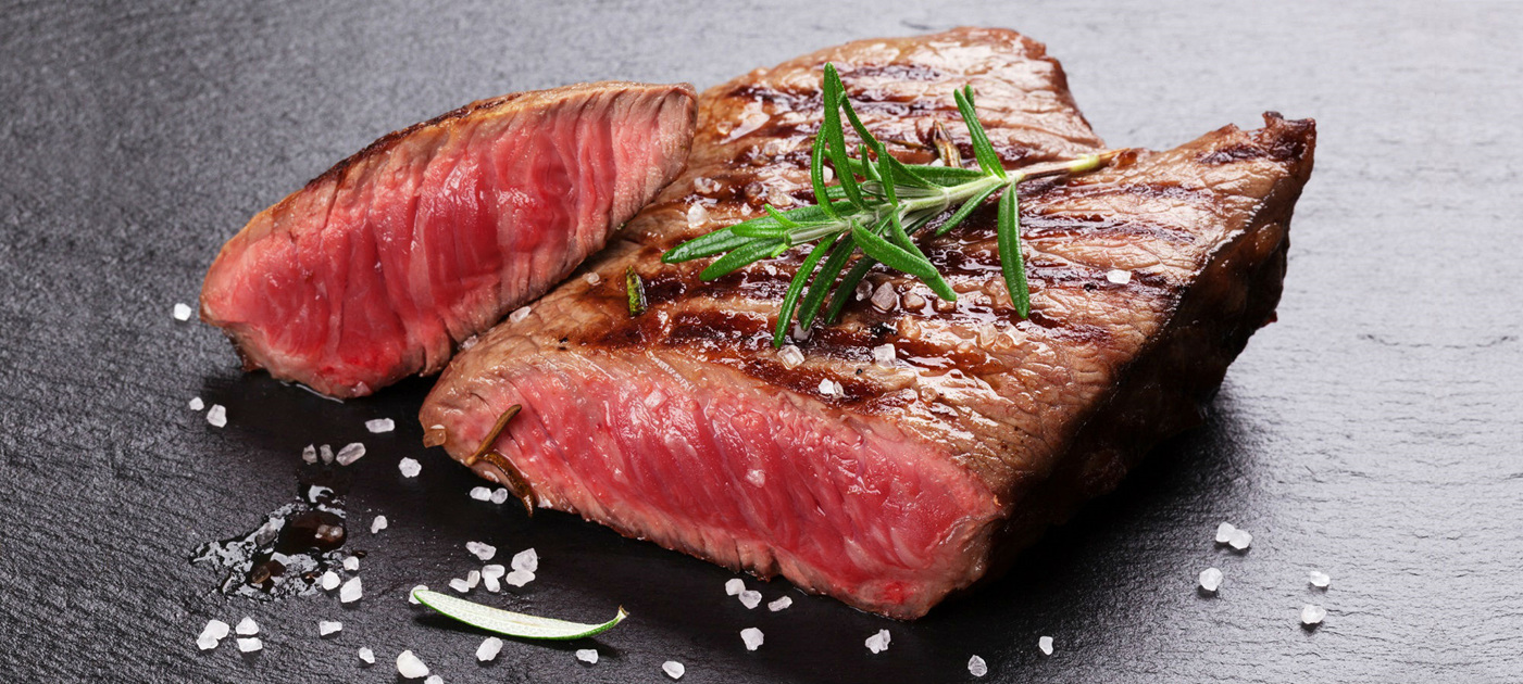 perfectly cooked steak with herbs